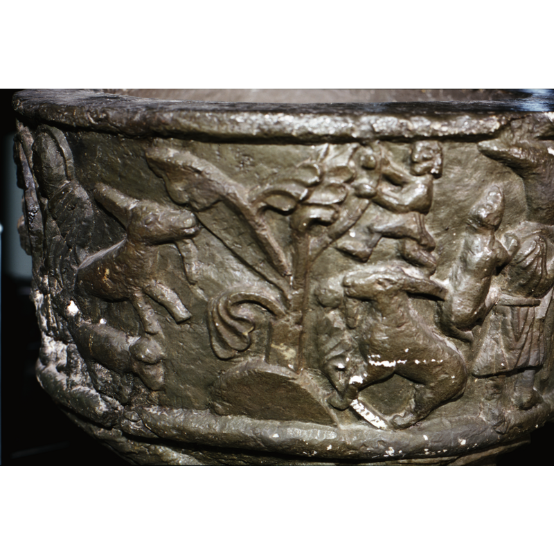 on the southeast side of the basin -- four quadrupeds, a child or young shepherd and a large acanthus plant appear to be the focus of this play scene
