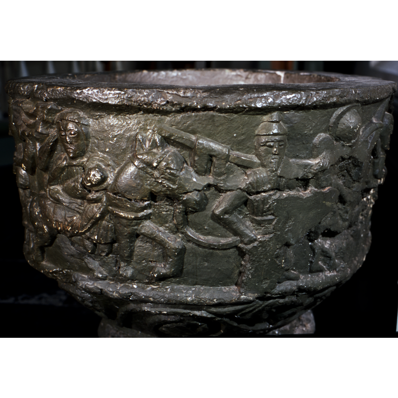 Joseph,staff on his shoulder, right arm akimbo holding the reins of the horse; Jew-hat on his head -- notice the damaged area to the right