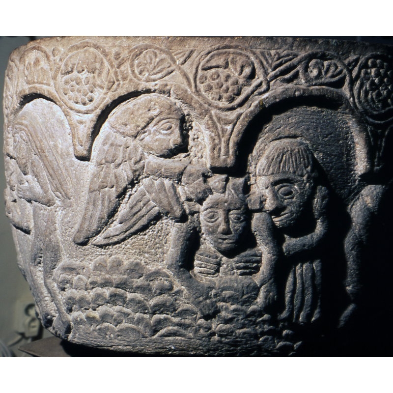 The first scene (moving from right to left) is the baptism of Christ; the angel on the left of Christ is pouring from a chalice holy water on to the head of Christ; Christ is being held around by the chest by a tonsured monk;. Christ has a cross on his head - but this representation alludes to the proceedure used to baptise infants.