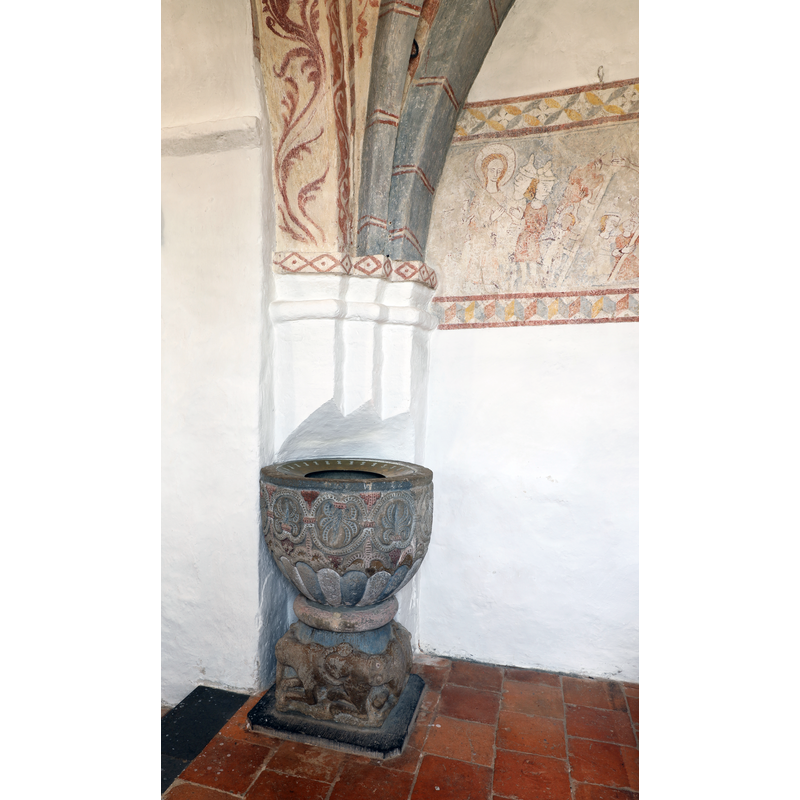 against the north pillar of the chancel arch