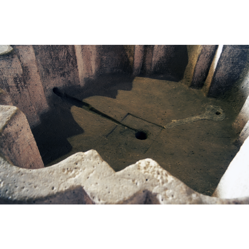 notice the two drain (?) holes and the trough leading to the side